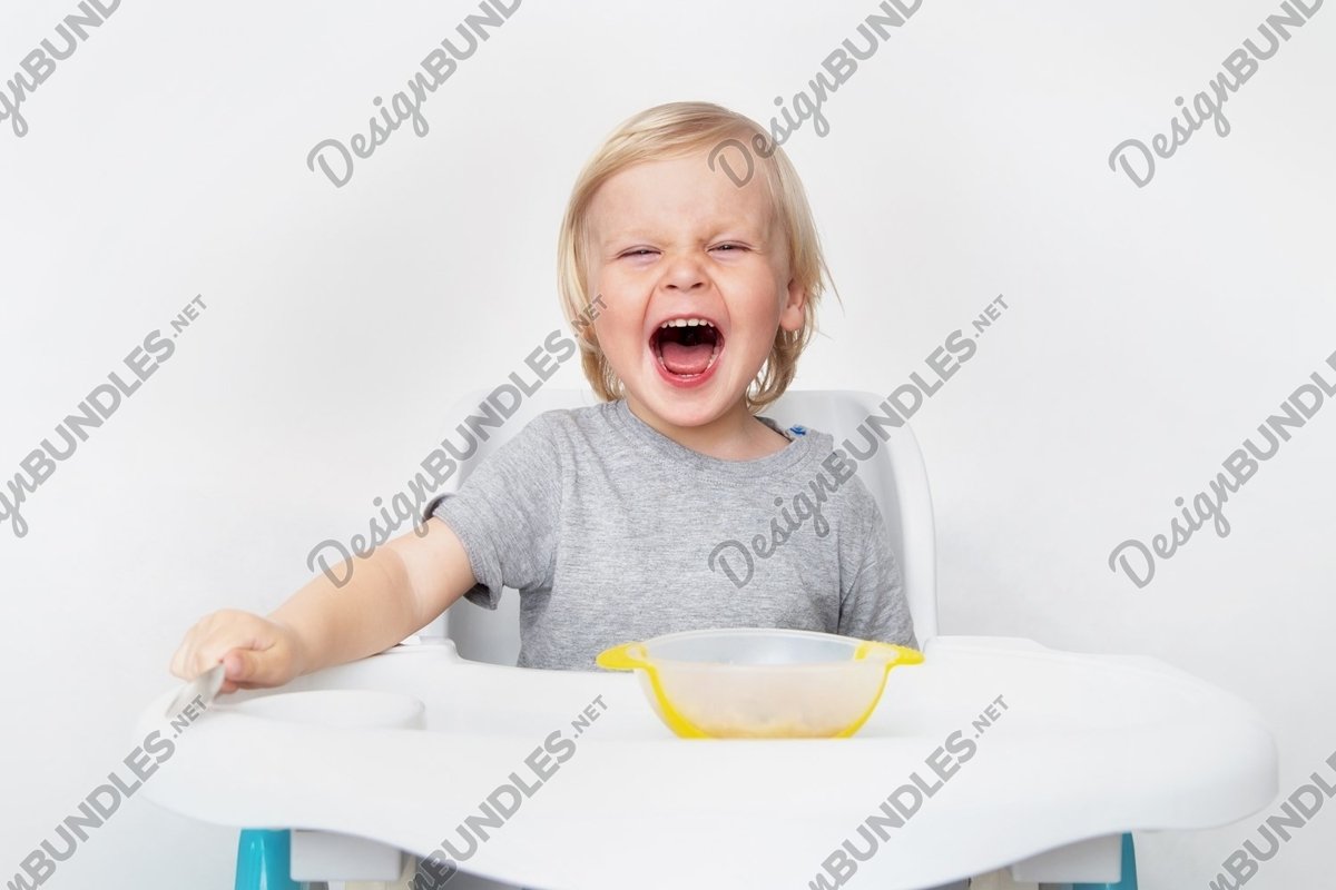 Photo of a child who does not want to eat example image 1
