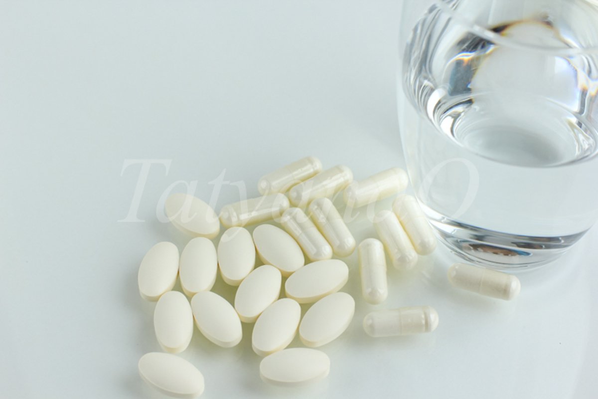 Multicolored pills, tablets against the virus, flu, disease example image 1
