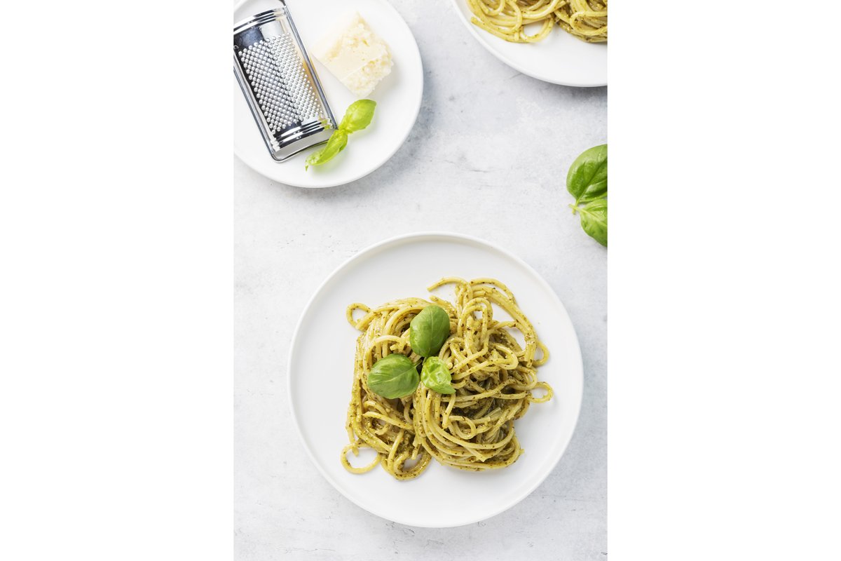 Italian spaghetti with pesto sause and parmesan cheese example image 1