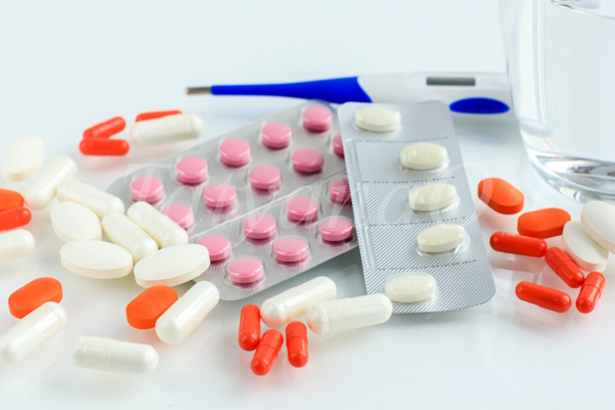 Multicolored pills, tablets against the virus, flu, disease example image 1