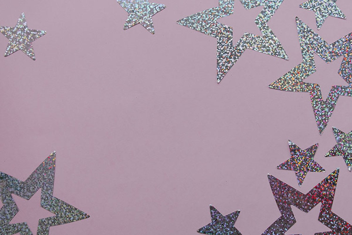 Silver sparkling christmas decoration on pink background. example image 1