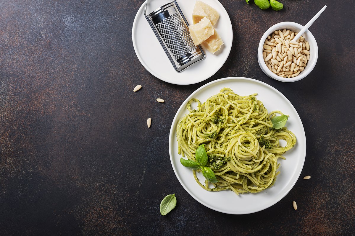Traditional Italian spaghetti with basil cream pesto. example image 1