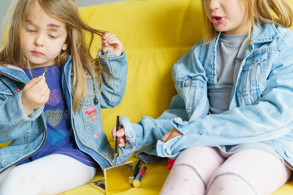 Hipster fashionable girls in denim jackets do mom's make up example image 1