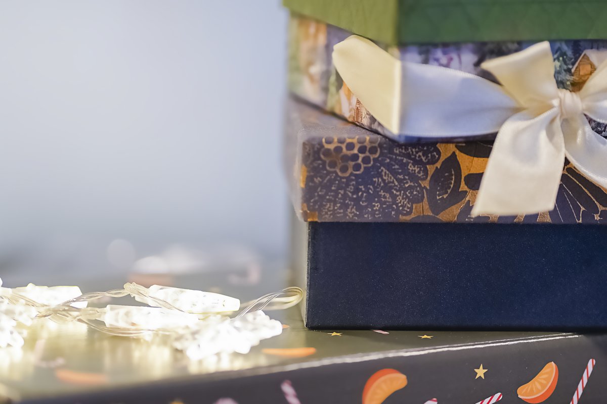 Atmosphere of Christmas,different gift boxes on blue example image 1