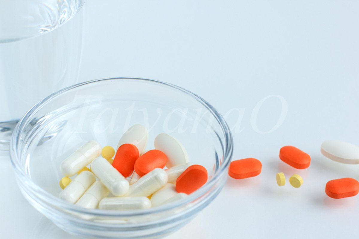 Multicolored pills, tablets against the virus, flu, disease example image 1