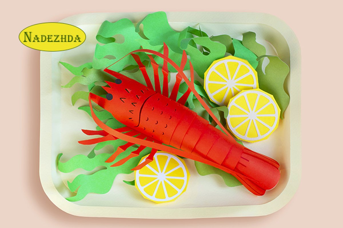 Paper spiny lobster with lettuce and lemon slices example image 1