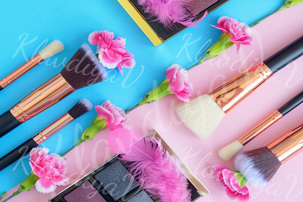 premium makeup brushes and blush on a colored background example image 1