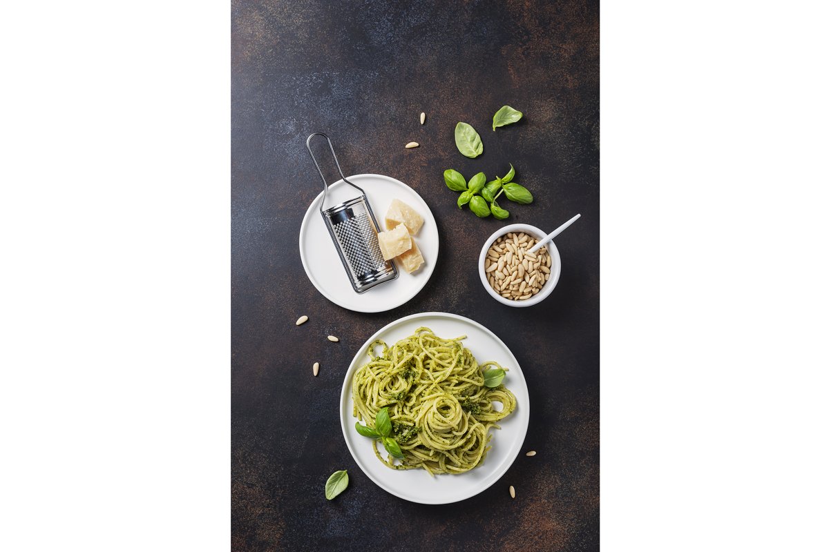 Traditional Italian spaghetti with basil cream pesto. example image 1