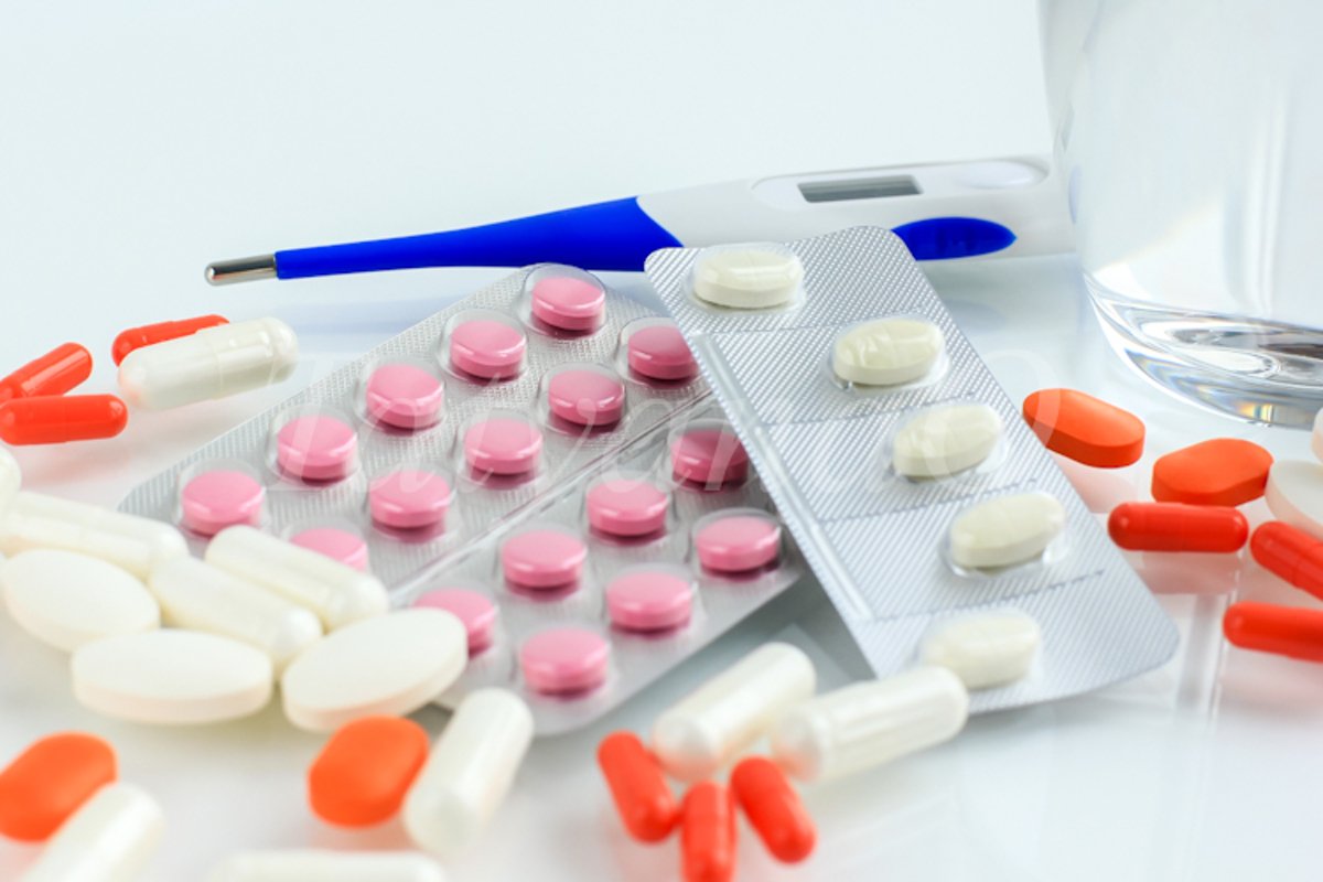 Multicolored pills, tablets against the virus, flu, disease example image 1