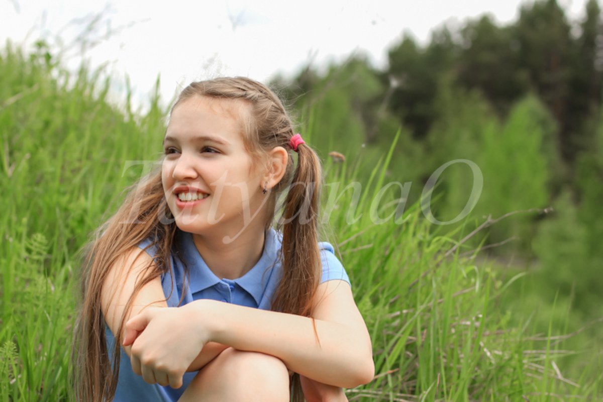 A young beautiful girl, a teenager walking in the Park example image 1