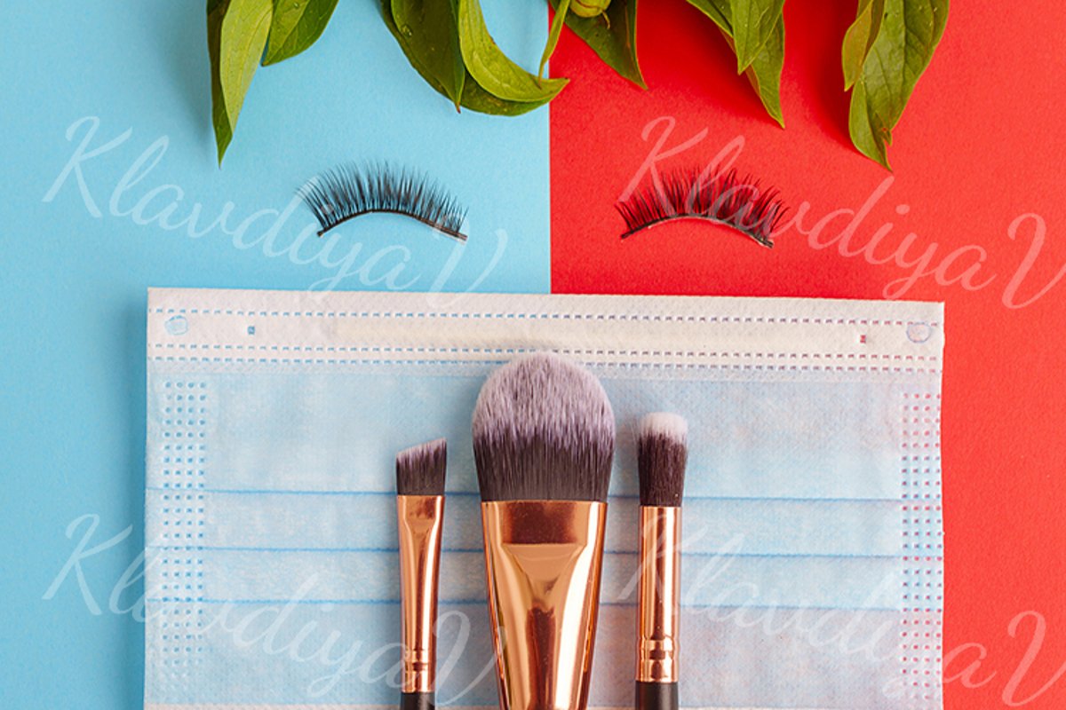 premium makeup brushes and blush on a colored background example image 1