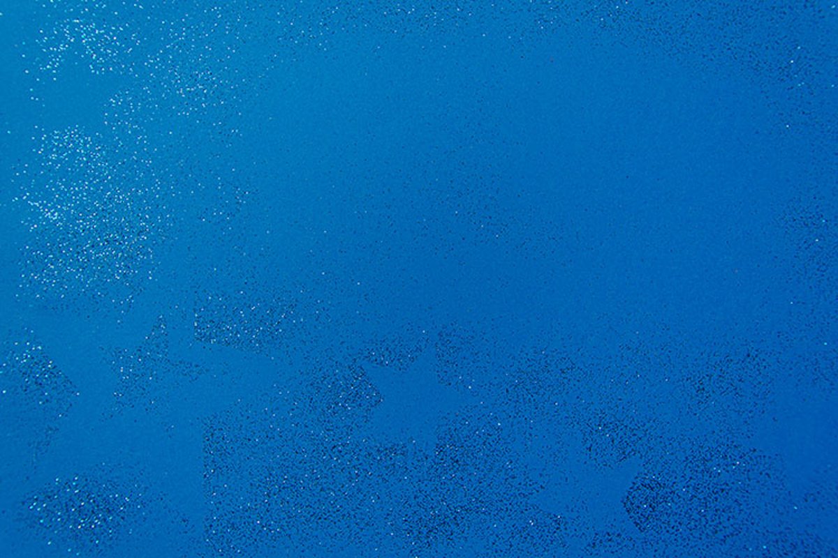 Silver sparkling christmas decoration on blue background. example image 1