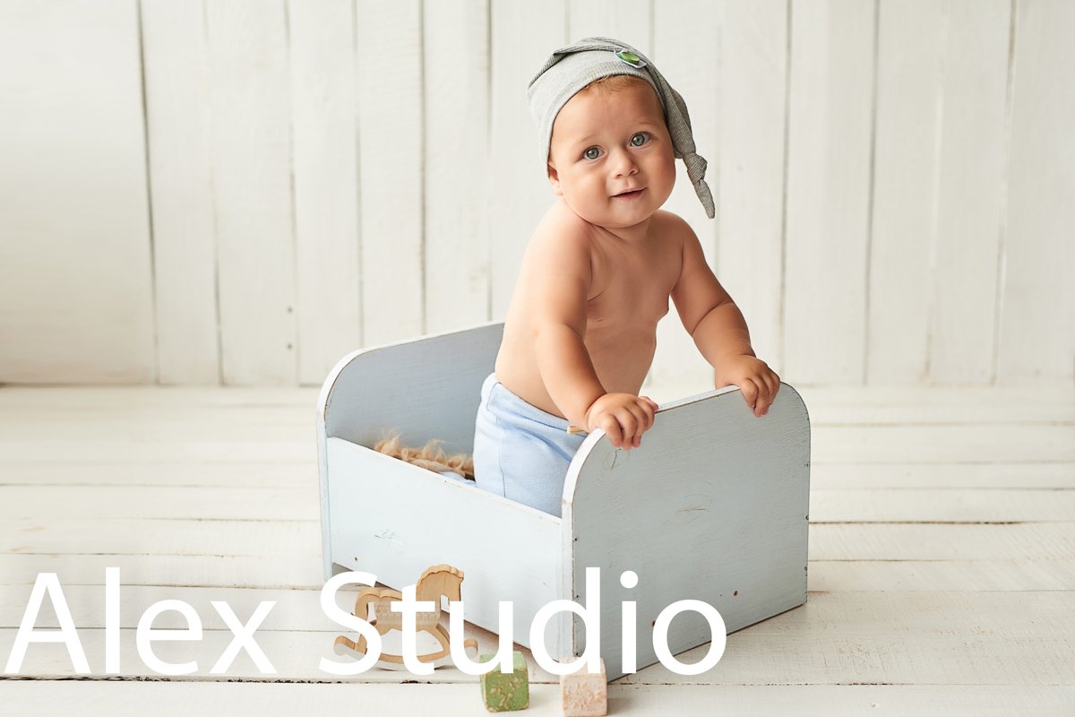 Child plays with toys. Happy Baby. example image 1