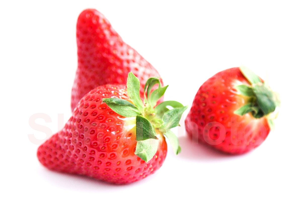 Fresh strawberries on white background example image 1