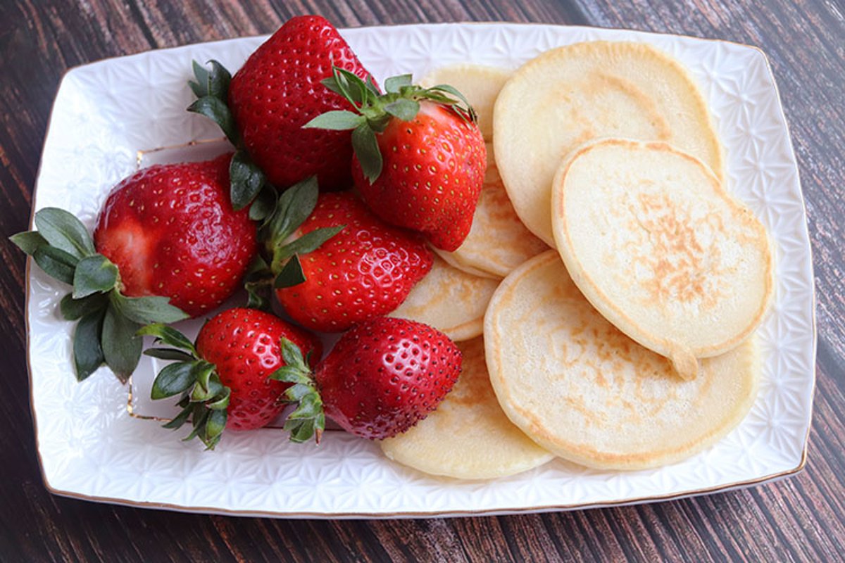 Breakfast pancakes and strawberries close-up example image 1