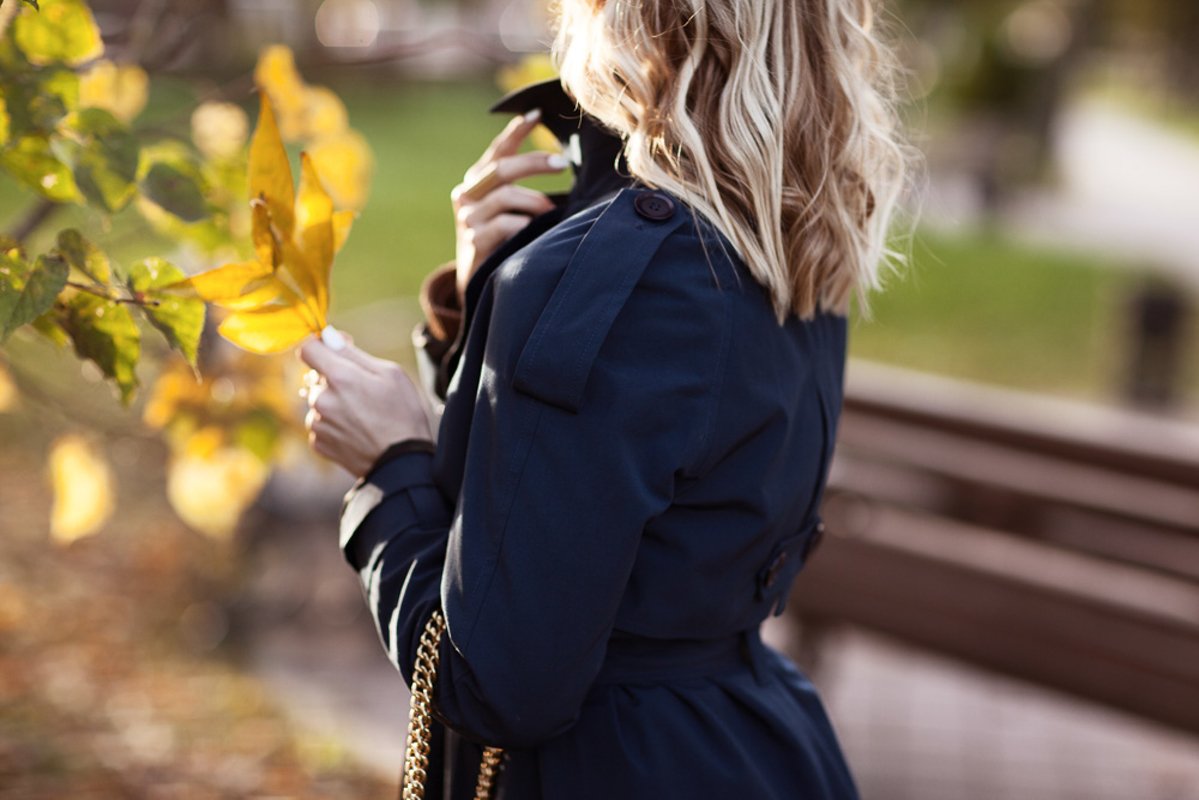 Stylish woman in a blue coat. Autumn, clothing details example image 1