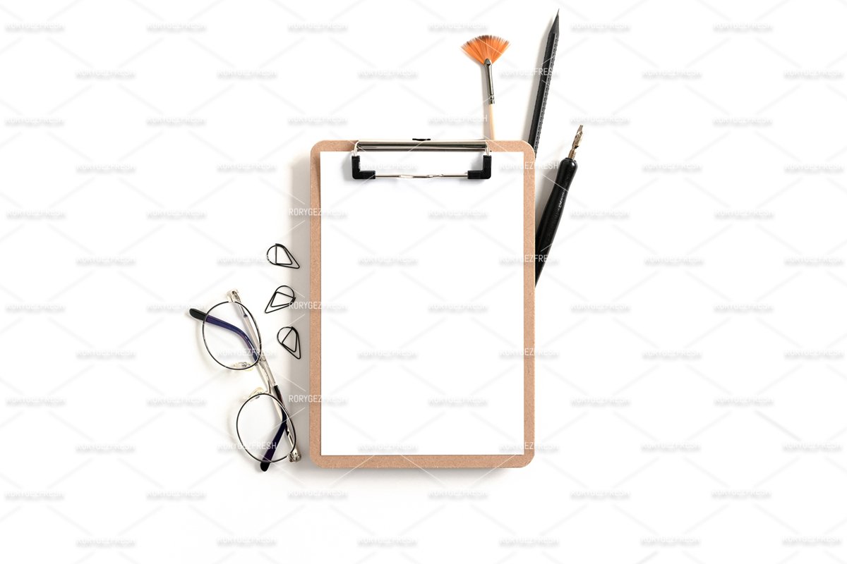 Clipboard mockup with frame made of stationery and glasses example image 1
