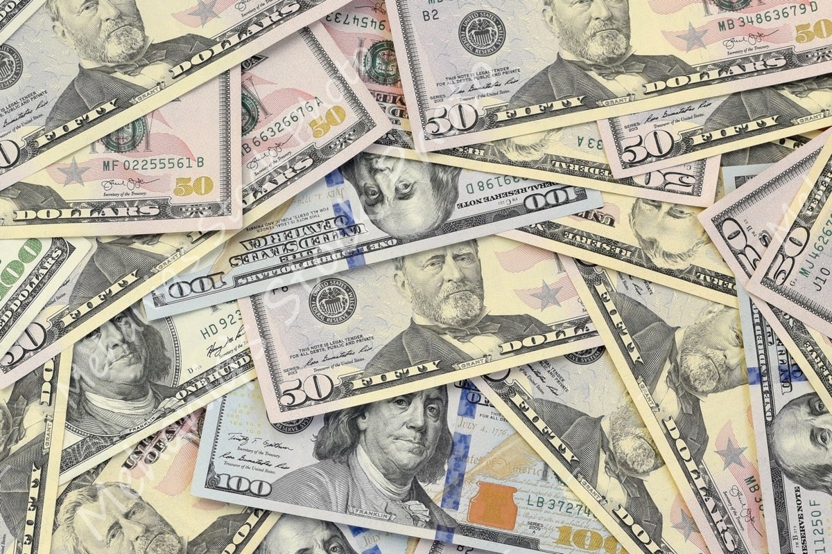 Many american dollar bills close up example image 1