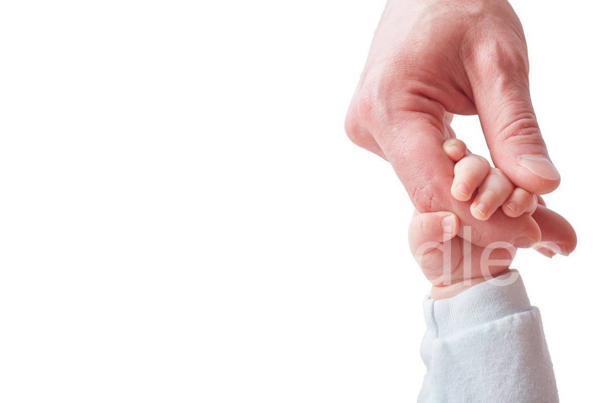 baby hand of an infant holds an adult male hand. example image 1
