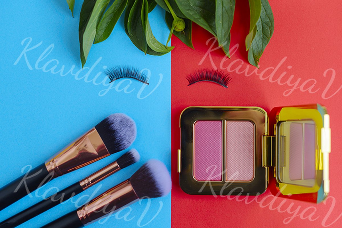 premium makeup brushes and blush on a colored background example image 1