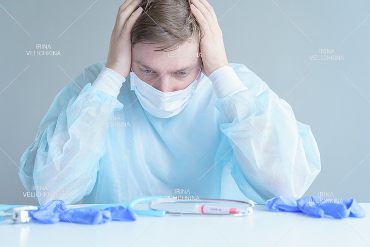 Doctor, patient in medical disposable hat, robe. Face mask example image 1