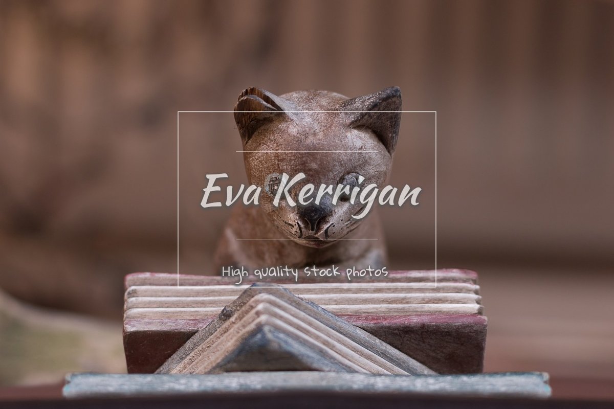 Wooden old statuette a book holder in the form of a cat. example image 1