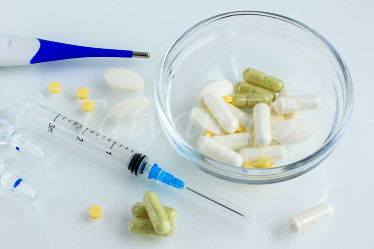 Multicolored pills, tablets against the virus, flu, disease example image 1