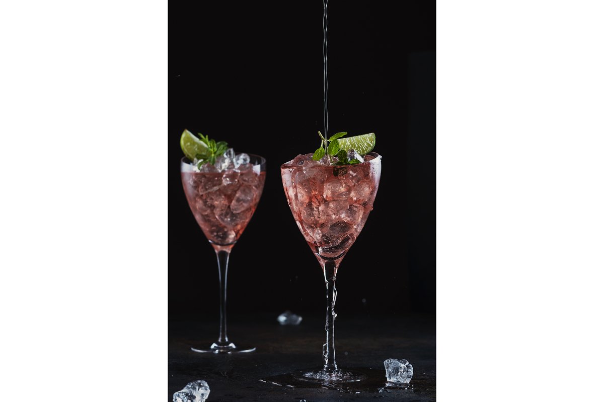 Summer cocktail with rose wine, lime, mint and ice example image 1