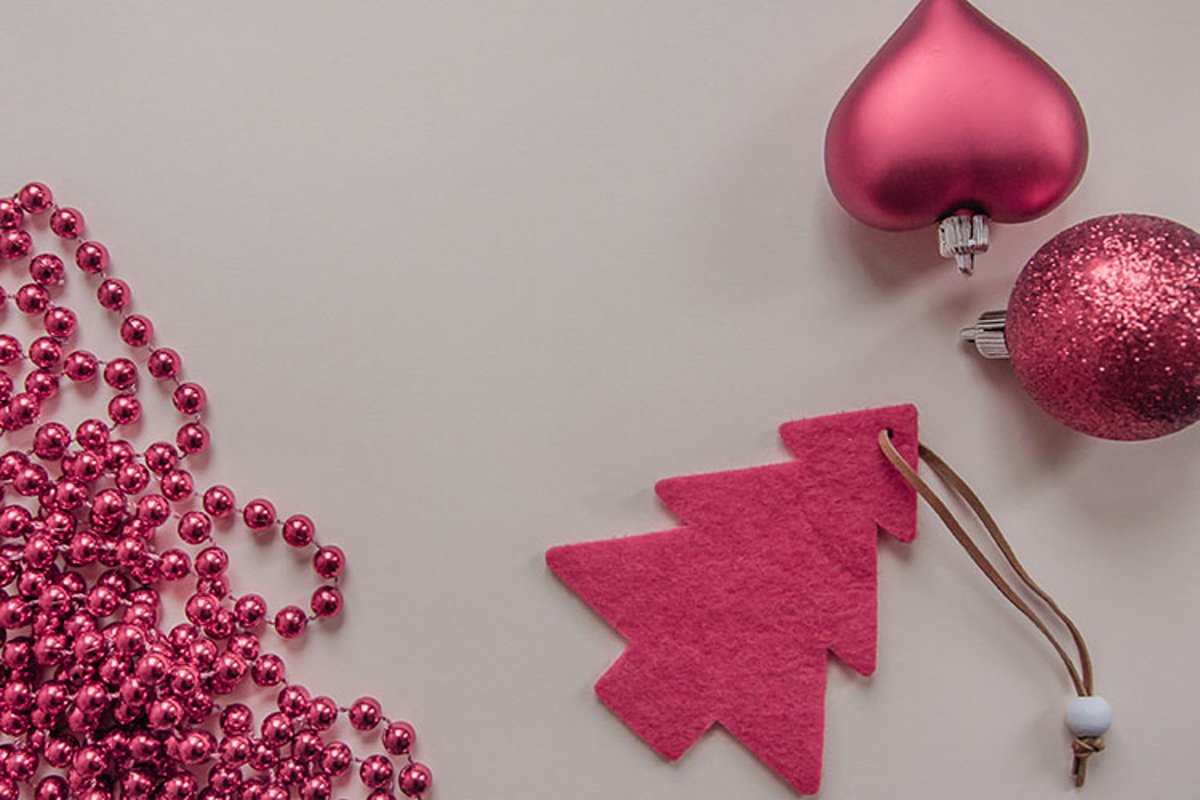 Red Christmas tree, beads, balls on a gray background. example image 1