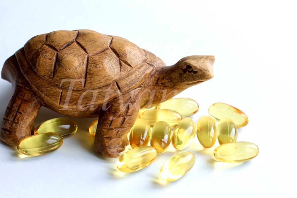 Omega 3 capsules lying on white background example image 1