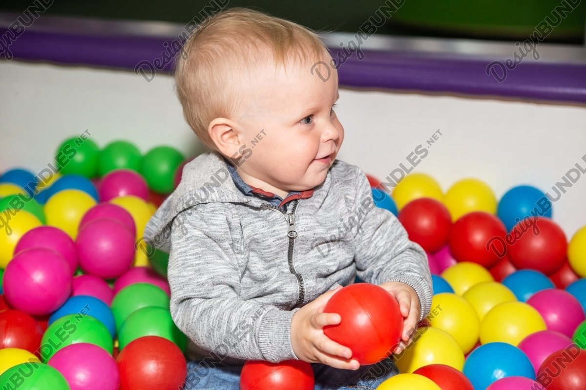 Photo of a ball pit poll at kids play center example image 1