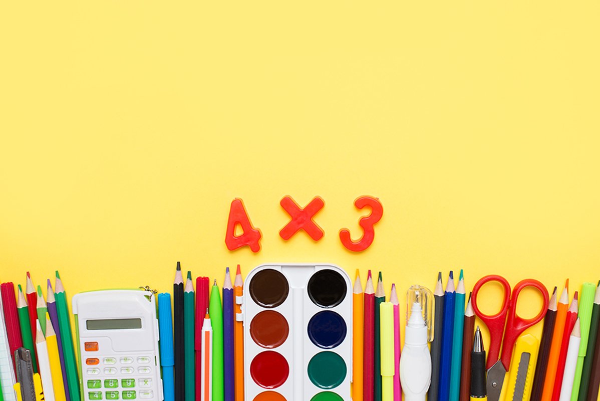 School accessories on yellow background. Flat lay example image 1