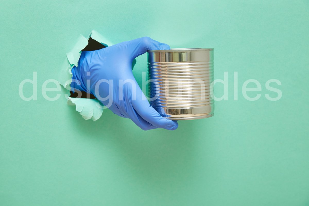 A hand in a blue protective rubber glove holds an iron can example image 1