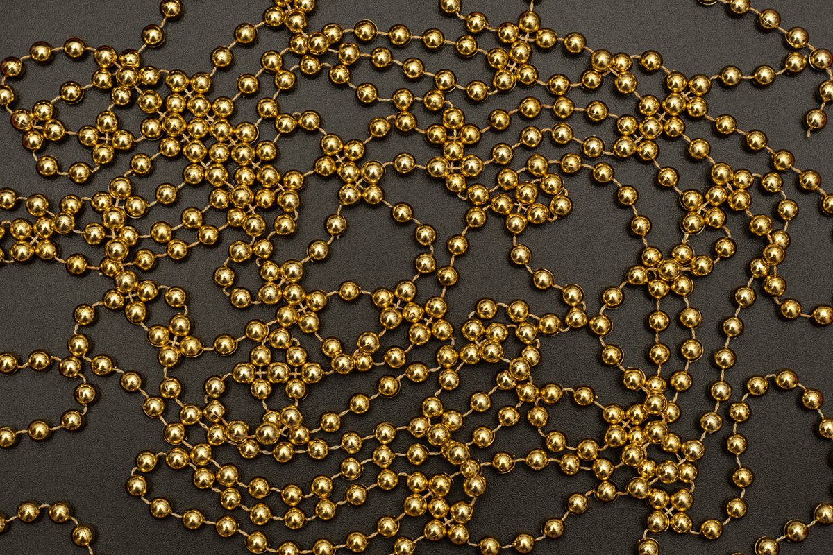 Christmas black background with golden beads. example image 1