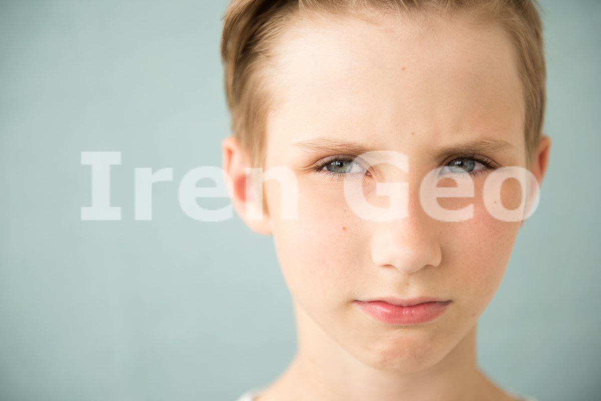 Portrait of a modern teenage boy. Studio shot. Youth culture example image 1