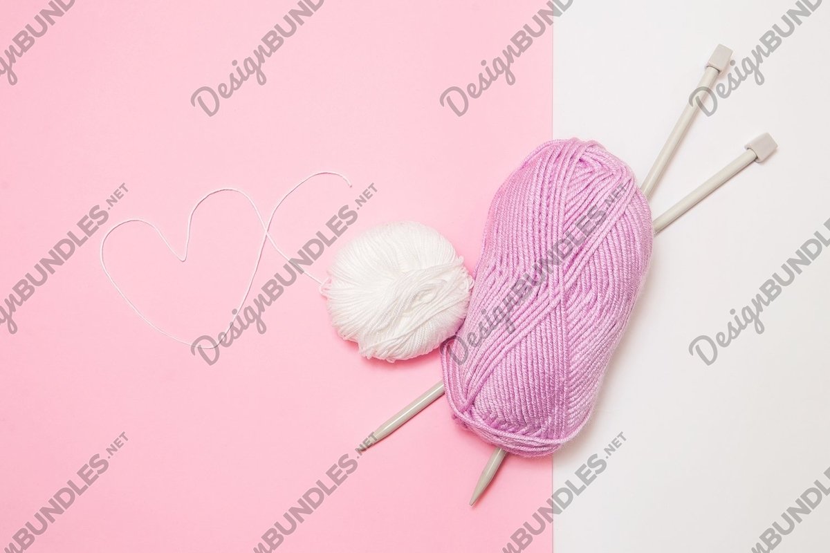 Photo of a Pink and white yarn with heart-shaped thread example image 1