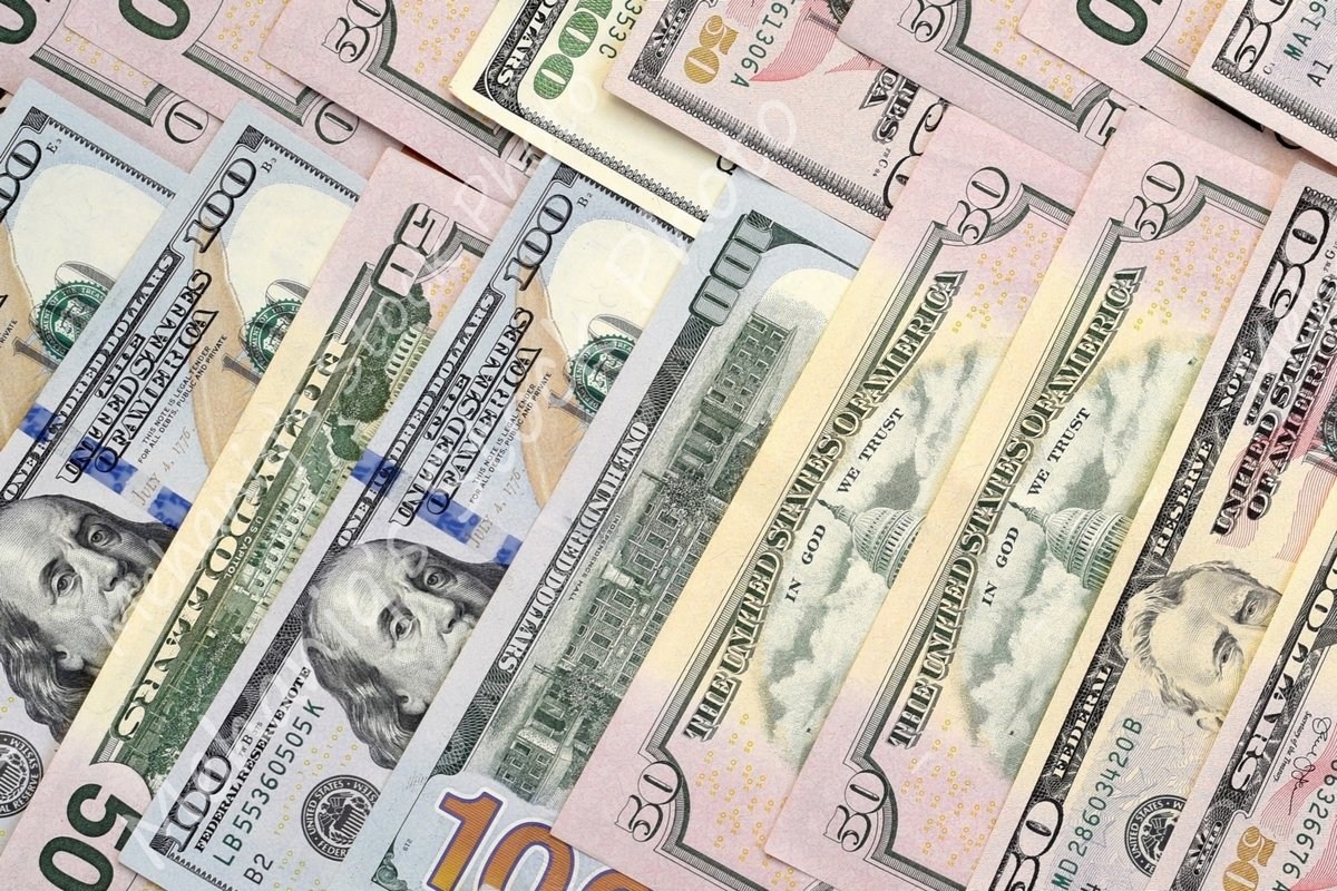 Many american dollar bills close up example image 1