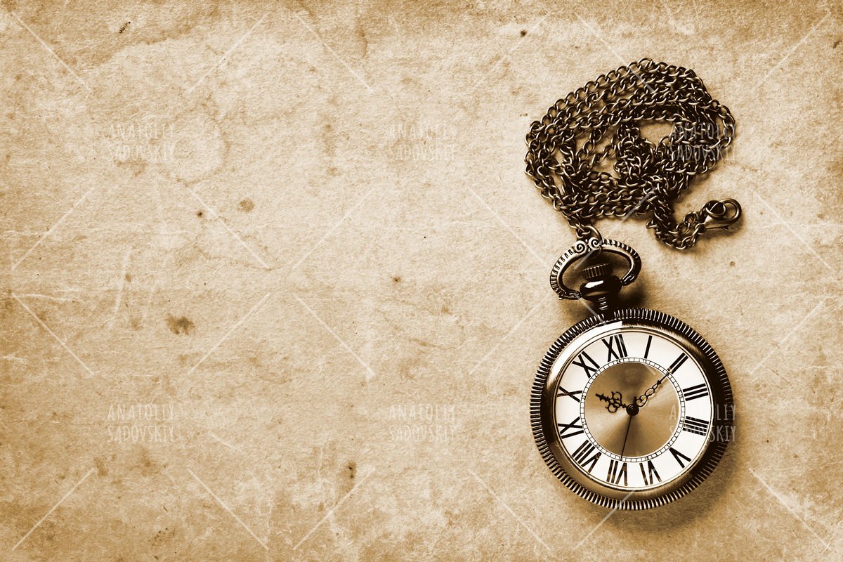 Vintage watch on old paper background example image 1