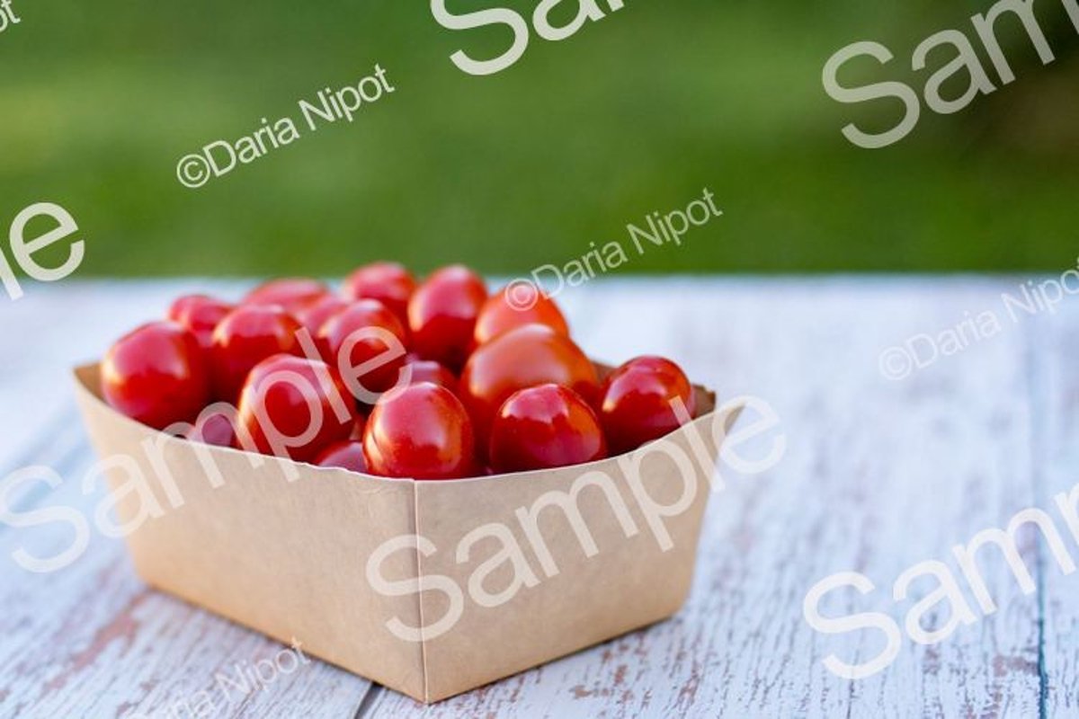 Cherry tomatoes in a recycleable paper box example image 1