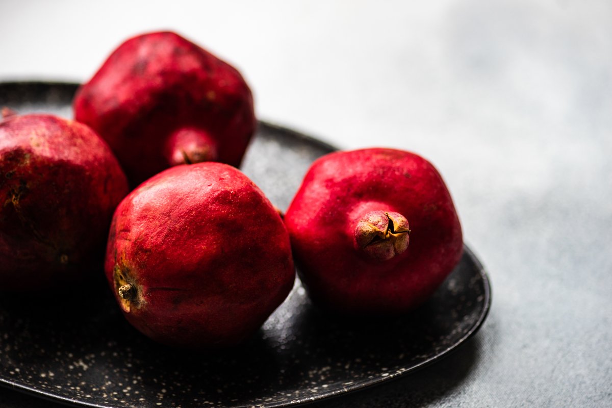 Organic food concept with fresh and ripe pomegranate example image 1