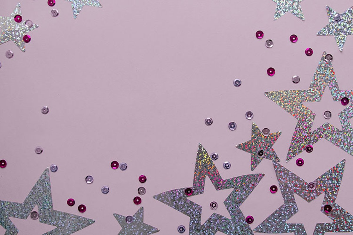 Silver sparkling christmas decoration on pink background. example image 1