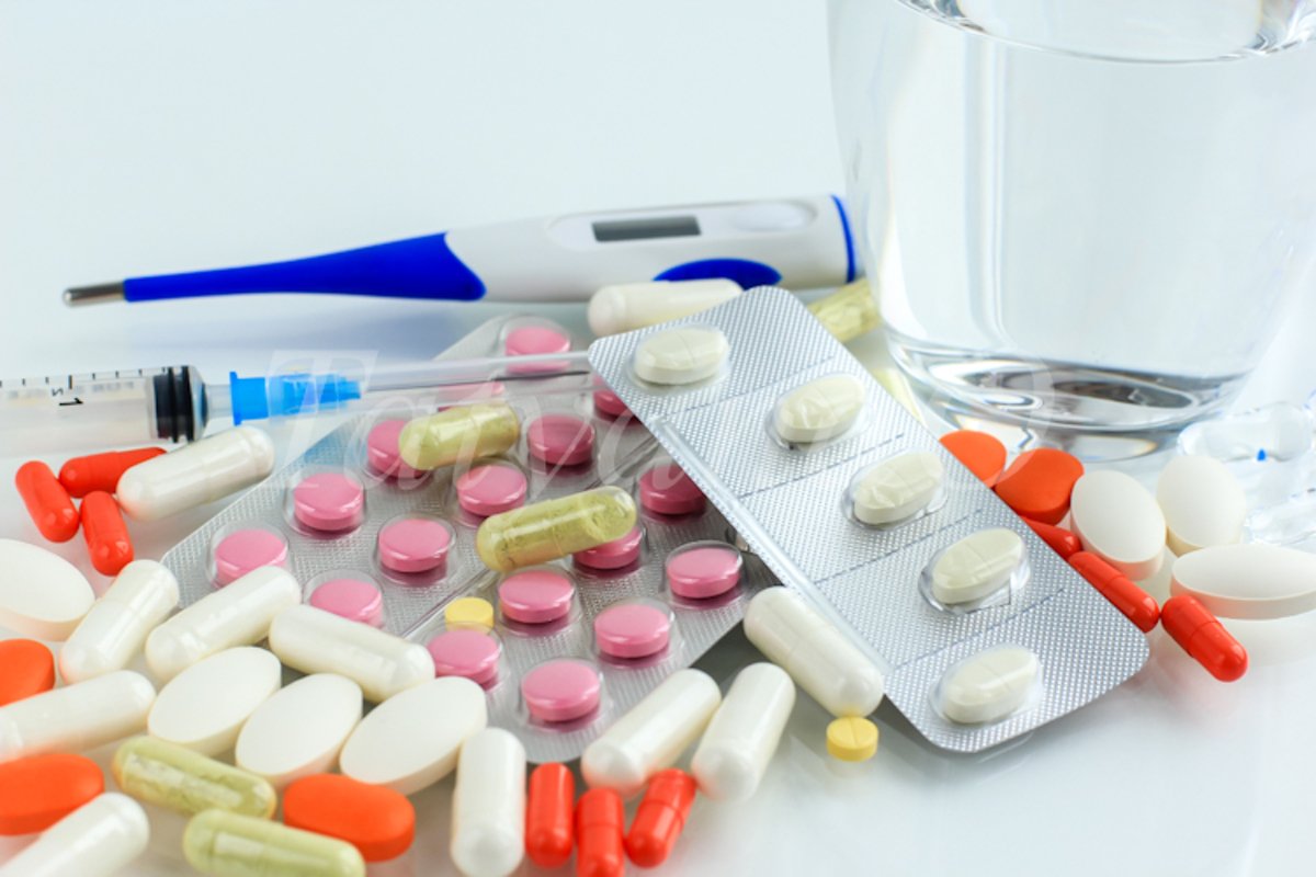 Multicolored pills, tablets against the virus, flu, disease example image 1