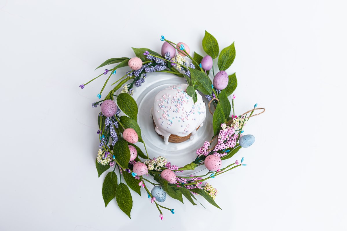 Easter cake in the center of a wreath of spring flowers example image 1
