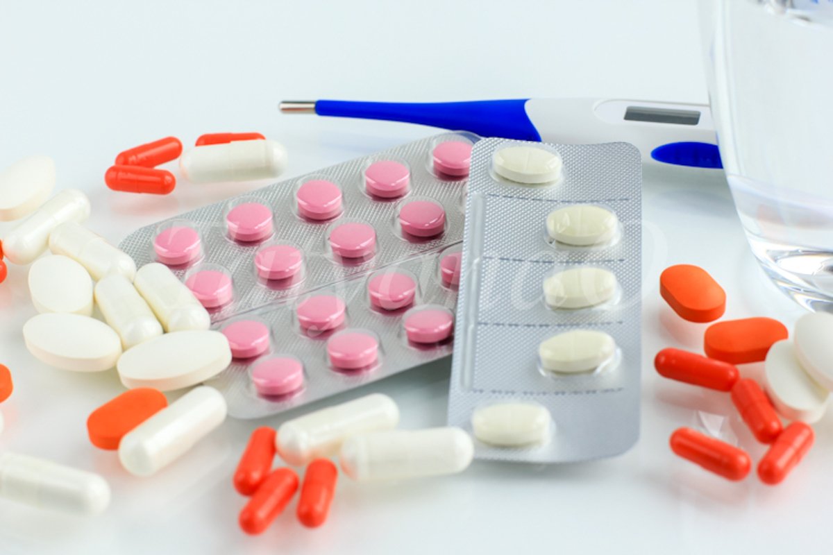Multicolored pills, tablets against the virus, flu, disease example image 1