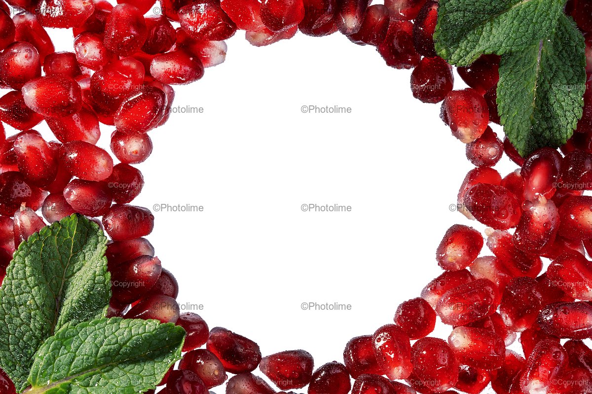 Pomegranate or garnet red seeds frame with mint leaves example image 1