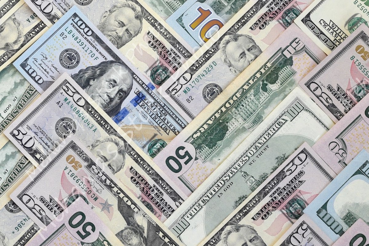Many american dollar bills close up example image 1