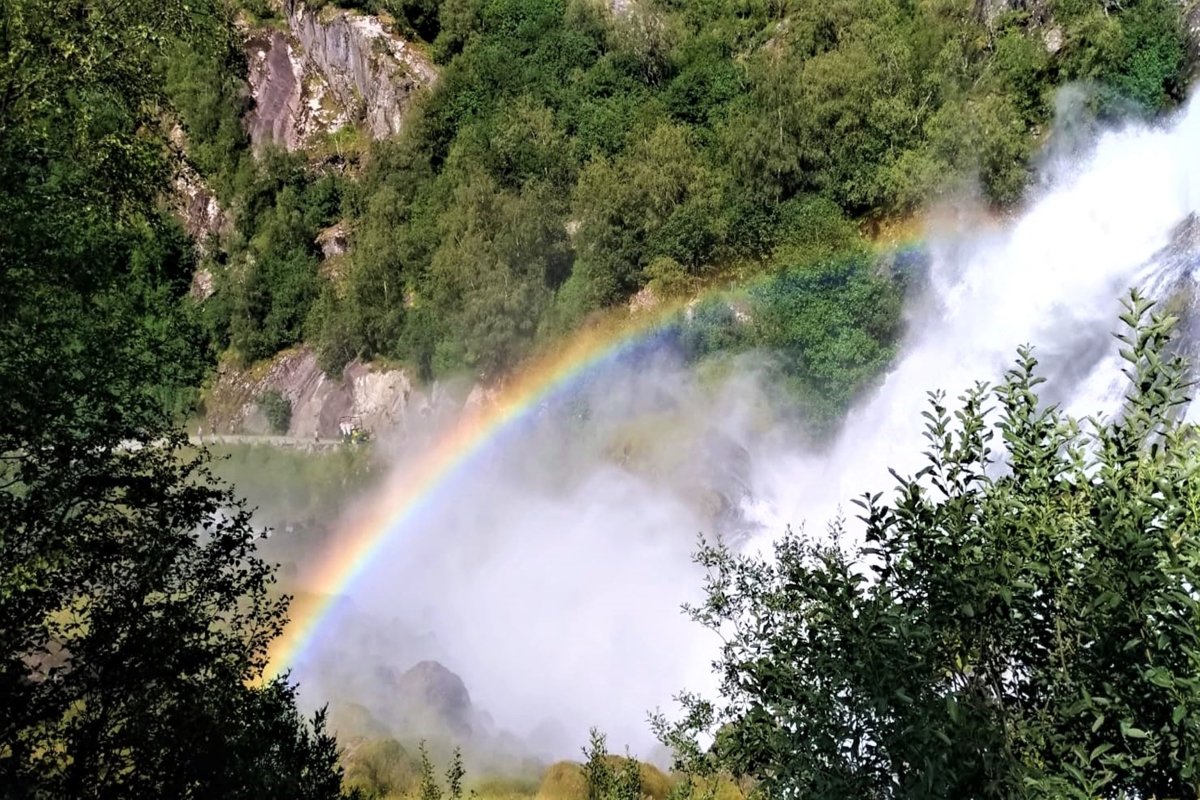 Bright rainbow over the waterfall from Olden in Norway example image 1