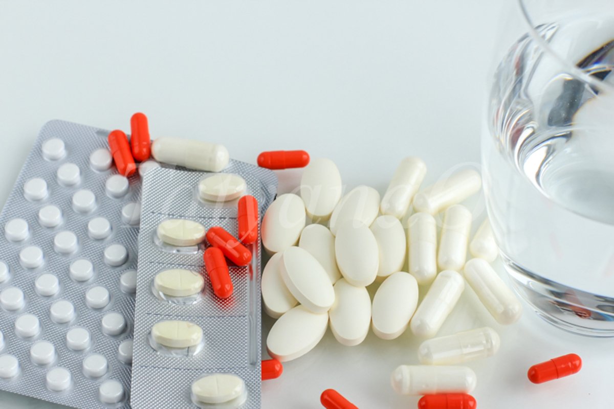 Multicolored pills, tablets against the virus, flu, disease example image 1