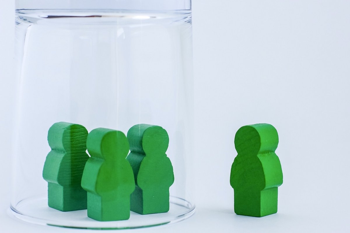 Toy wooden people under a glass. example image 1