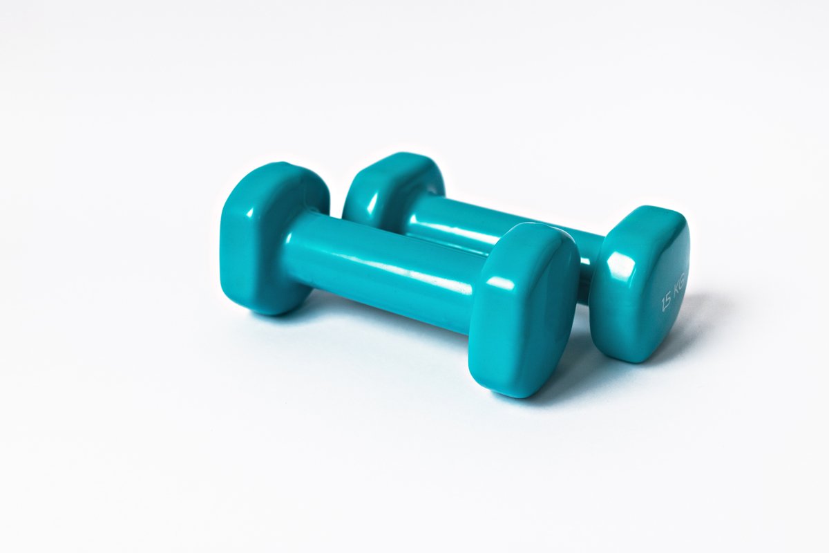 Blue dumbbells for fitness on a white background. example image 1